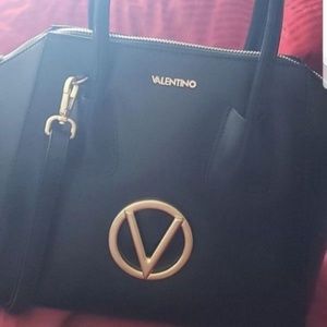Nice purse / by Mario Valentino
